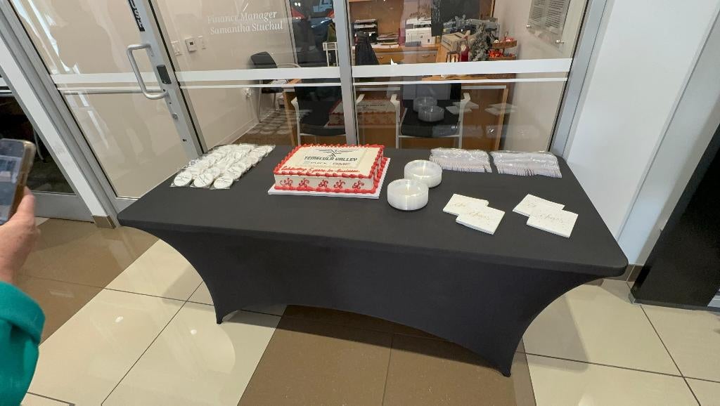 Table with cake at the 5th year anniversary celebration